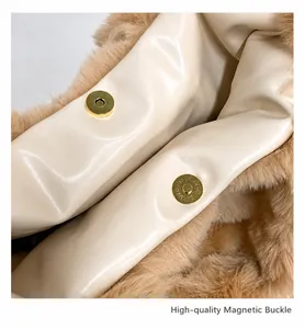 Detail view of high-quality magnetic buckles on the plush tote bag inner lining