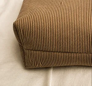 Detail showing the precision stitching and corduroy texture on this khaki tote bag