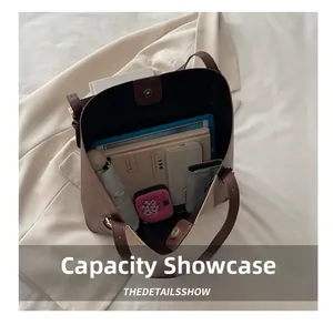 Macro view of the large capacity tote bag interior showing ample storage space
