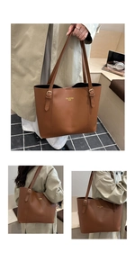 Detail view of caramel brown leather tote bag with adjustable straps and gold hardware