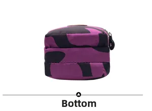 Detailed bottom view of the purple and black camouflage crossbody mini mobile phone bag