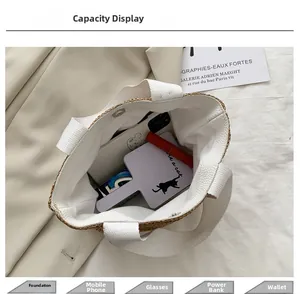 Top view of woven beach bag interior with canvas lining and daily essentials