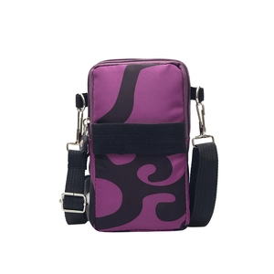 Vertical mini crossbody phone bag in purple and black vortex pattern with nylon strap