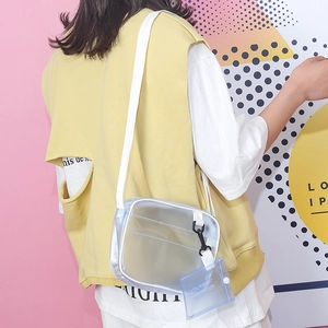 Bolso bandolera cuadrado de PVC transparente con ribete blanco y etiqueta azul