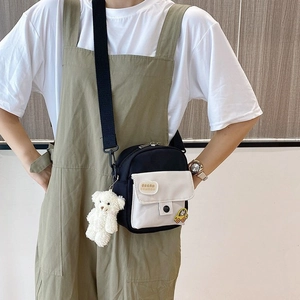 Cute Japanese style black and white canvas crossbody bag with teddy bear pendant