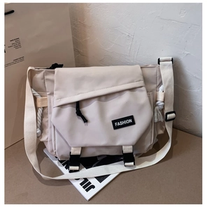 Japanese workwear beige crossbody messenger bag with buckle strap and fashion label