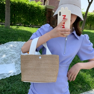 2025 Summer woven straw handbag with white canvas handles for beach vacation style