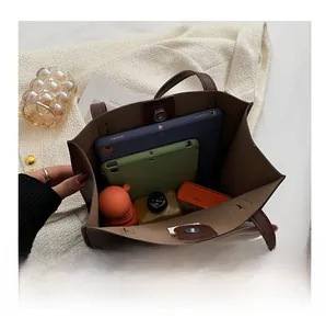 Top view showing the large capacity interior of the tote bag with daily essentials