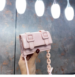 Pink minimalist crossbody flap bag with large decorative chain strap for women