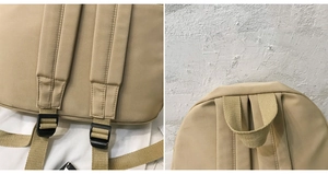 Detailansicht der khaki Nylon-Rucksackgurte mit langlebigen Kunststoffschnallen und Tragegriff