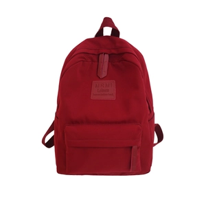 Minimalist deep red nylon travel backpack for women with large capacity and multi pockets