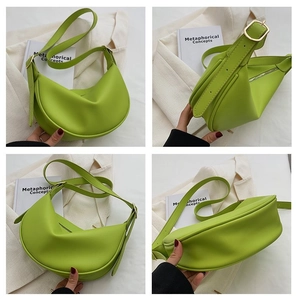 Detailed views of bright green crescent shoulder bag with golden hardware and adjustable strap