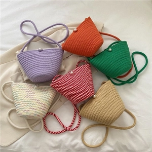 Mini woven crossbody bucket bag with pearl buckle in multiple stylish colors