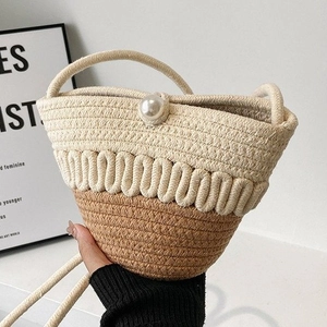Mini pearl straw bucket bag with hand-woven contrast colors for summer beach wear