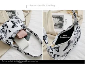 Detail view showing spacious interior of white butterfly print shoulder bag for daily items
