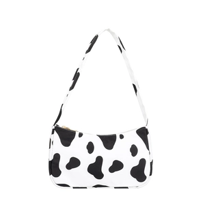 Modische Damen-Achseltasche mit Schwarz-Weiß-Kuhmuster und goldenem Reißverschluss
