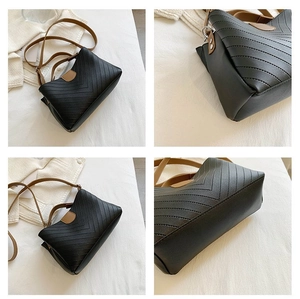 Multi-angle view of black quilted faux leather crossbody bag with brown shoulder strap