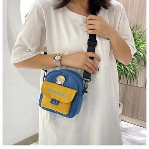 Bolso bandolera de lona estilo japonés en azul marino y amarillo con lindo parche animado
