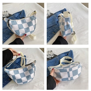 Detail of blue checkerboard crescent bag showing multi-angle views and knit texture