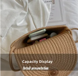 Detail view of the beige woven bucket bag capacity with daily items and magnetic snap