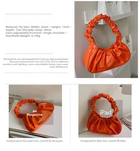 Orange PU cloud bag detail with dimensions 26x13x7cm and fixed 40cm shoulder strap