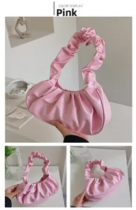 Detailed view of pink ruched cloud bag with soft PU pleats and scrunchie style handle