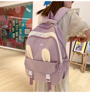 Cute purple and white school backpack with rabbit ears and multi-pocket design