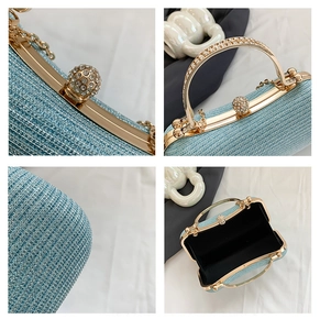 Detail of light blue evening bag showing rhinestone handle and clasp with glitter fabric