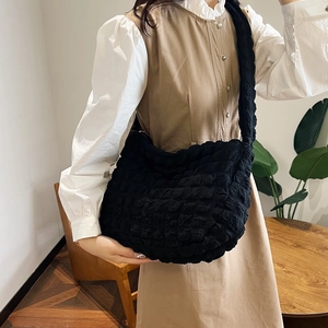 Large black popcorn quilted shoulder bag with cloud texture for casual daily wear