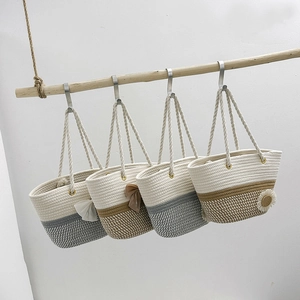 Summer woven tote bags with daisy charms and silk bows in four neutral colorways