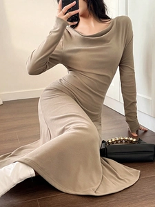 Slim fit long sleeve brown knit dress with elegant cowl neck and midi length drape