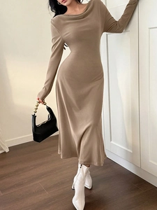 Close-up of khaki bodycon long sleeve maxi dress with cowl neck knit texture