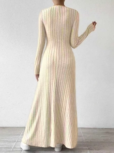 Detail of slim-fit ribbed knit maxi dress showing vertical stripes and back silhouette