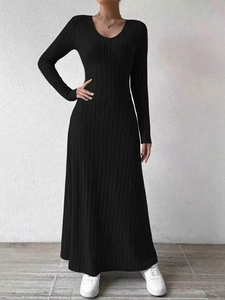 Close-up of black ribbed texture fabric on a slim-fit V-neck maxi dress for women