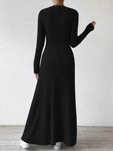 Back view of slim fit black ribbed knit V-neck maxi dress with long sleeves
