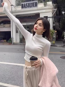 Slim fit white mock neck long sleeve top in soft thermal fabric for winter styling