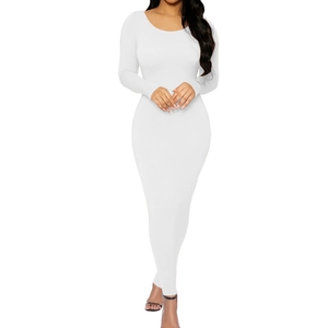 Slim fit long sleeve white maxi dress with round neck for a minimalist elegant style