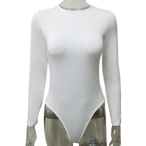 Detail of white long sleeve bodysuit featuring crew neck and slim fit jersey fabric