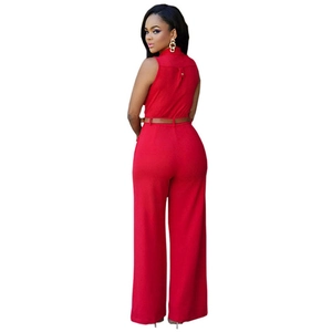 Sleeveless red high-waisted wide-leg jumpsuit with brown belt and buttoned collar detail