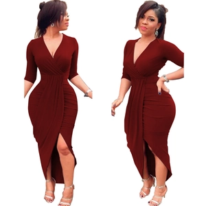 Detail of wine red V-neck dress with ruched waist and irregular front split hemline