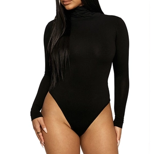 Detail of black turtleneck bodysuit showing slim fit sleeves and high-quality elastic fabric
