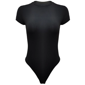 Detailed close-up of a black short sleeve bodysuit featuring a classic round neckline