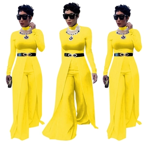 Detail view of bright yellow two-piece set with long sleeve top and flared trousers