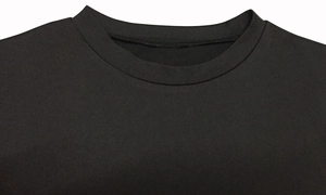 Close-up of the reinforced crew neck stitching on a black ribbed bodysuit fabric
