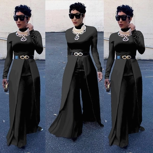 Chic black long sleeve jumpsuit with side slit floor-length hem and metal eyelet belt