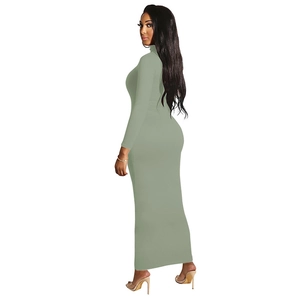 Detail view of sage green long sleeve slim fit maxi dress with a mock neck design