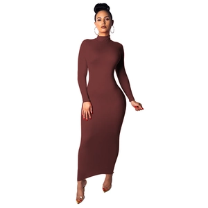 Detail view of the brown turtleneck maxi dress showing the slim fit stretch fabric