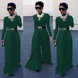 Detail of forest green long sleeve jumpsuit featuring wide legs and high collar design