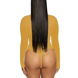 Detail view of mustard yellow bodysuit featuring a slim fit thong cut and long sleeves