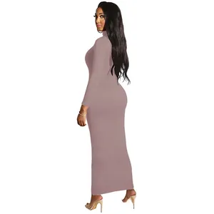 Detail showing the mock neck and dusty rose knit fabric of the long-sleeved dress